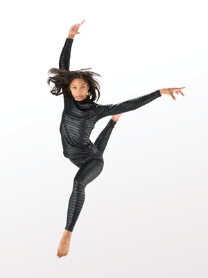 Woman doing ballet jump in Seirus Base Layers