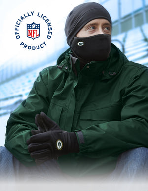 Person wearing green jacket, black beanie, and gloves with NFL Green Bay Packers logo, sitting outdoors.