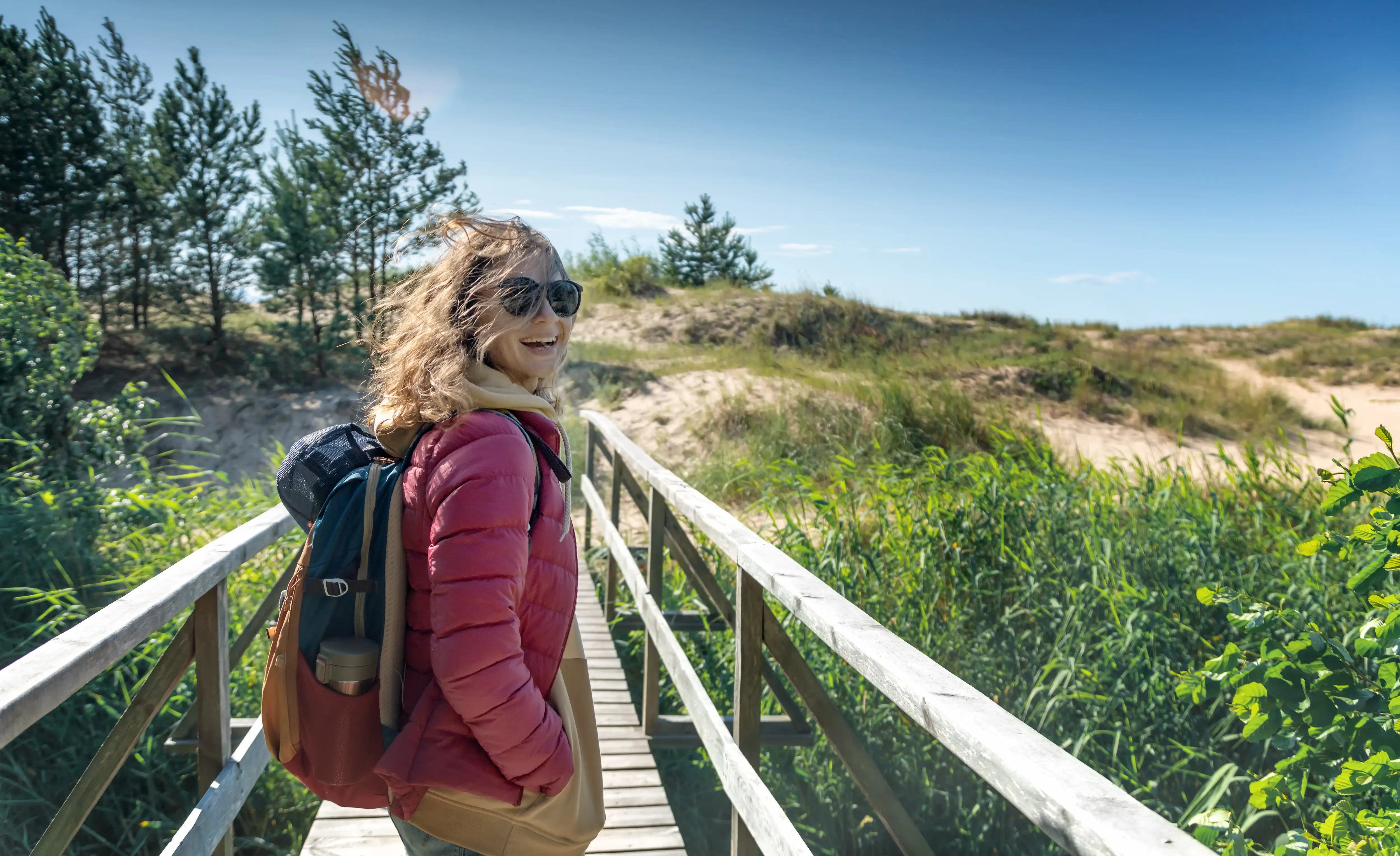 Woman walking on a breezy day