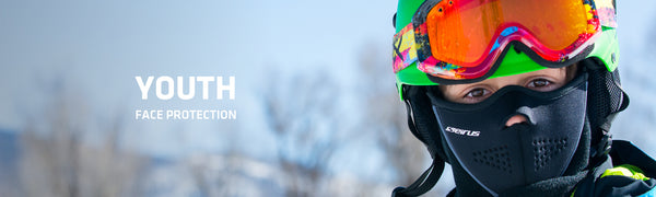 Young person in balaclava helmet and goggles up
