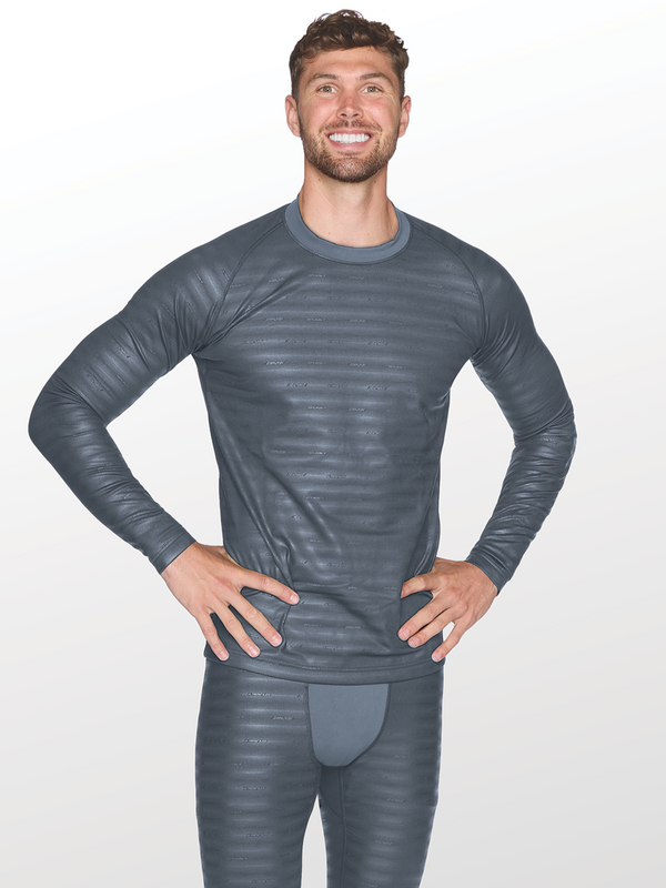 Man standing with hands on hips wearing mens grey reflective base layer top and bottom