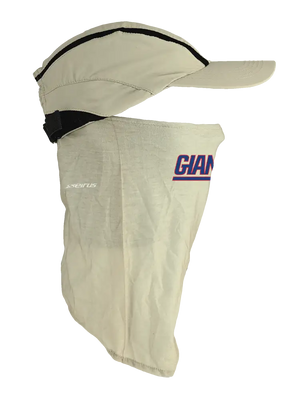 A beige baseball cap with a matching beige neck gaiter face covering, both featuring Giants logo displayed on a white mannequin head against a white background.
