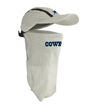 A light gray baseball cap with a matching neck gaiter face mask attached, featuring the Dallas Cowboys star logo on the cap and 'COWBOYS' text on the neck gaiter.