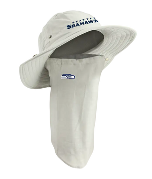 A Seattle Seahawks sun hat with an attached neck gaiter, in light tan with navy ‘Seahawks’ on the hat and Seahawks team logo on the right cheek of the neck gaiter.
