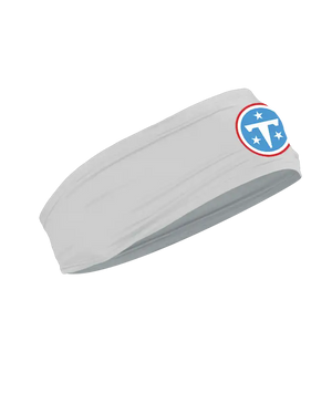 A gray athletic headband featuring the Tennessee Titans logo on the forehead, displayed against a solid white background.